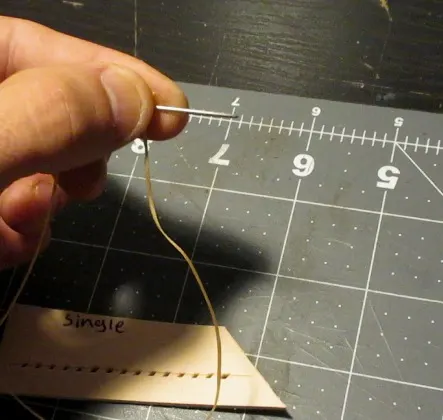 stitch leather by hand