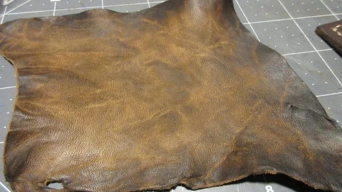 aging leather through rubbing alcohol