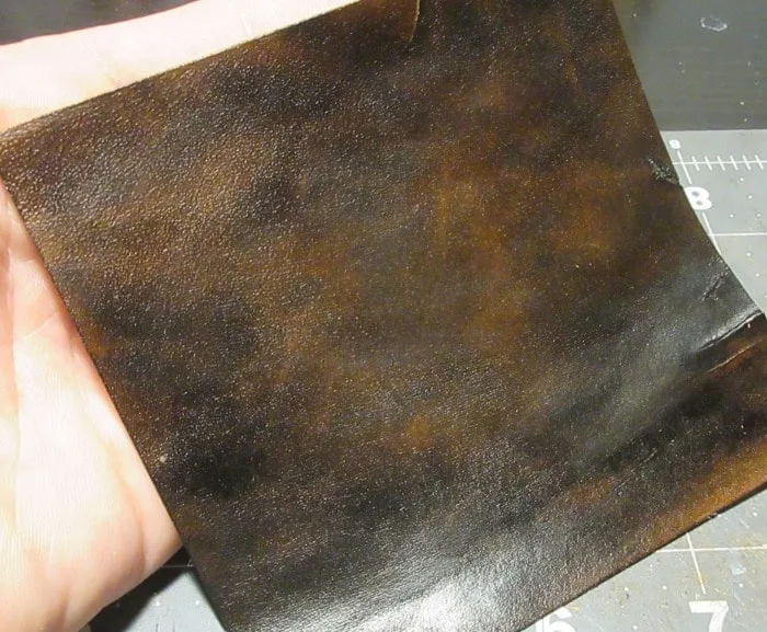 aging leather through rubbing alcohol