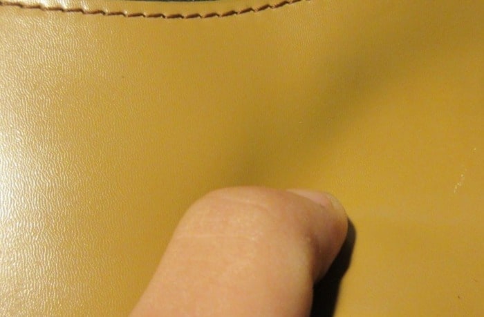 pressing on fake leather