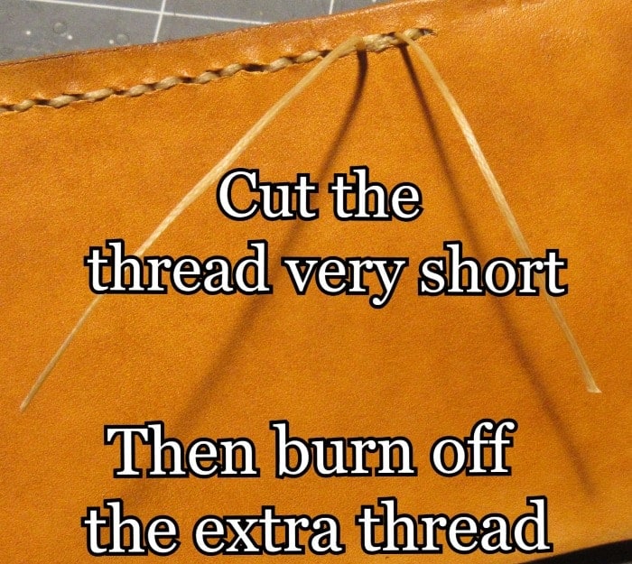 Cut the thread and burn the extra part